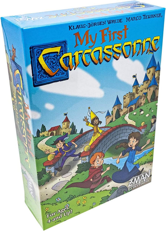 Box of 'My First Carcassonne' board game featuring cartoon illustrations of characters and medieval castles on a blue background.