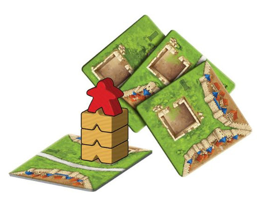 Board game pieces with green and brown tiles and a red meeple on a white background
