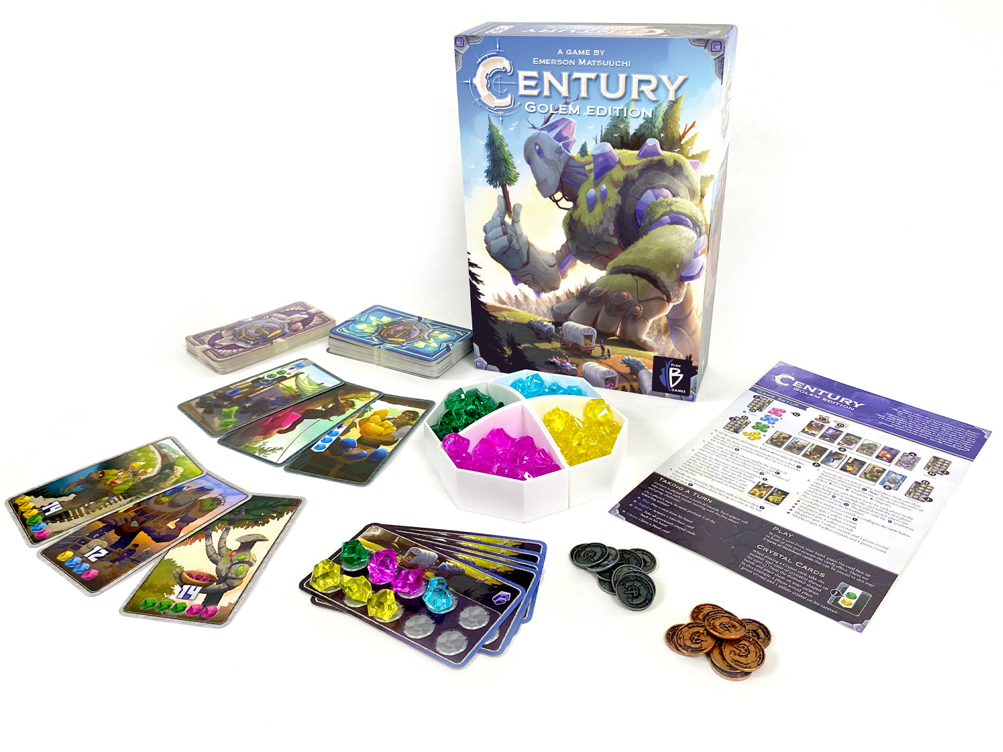 Boxed board game 'Century: Golem Edition' featuring an illustration of a golem character holding a tree. all game components are spread out on a white background