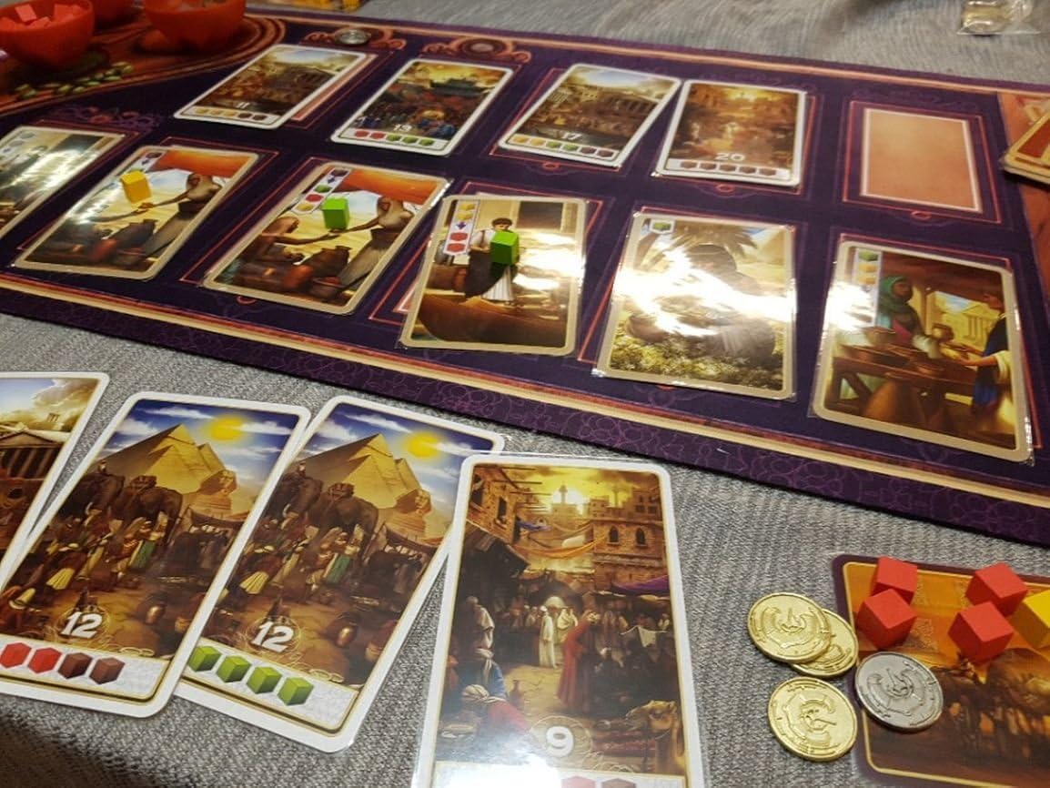 board game Century: Spice Road with cards and game pieces on a table
