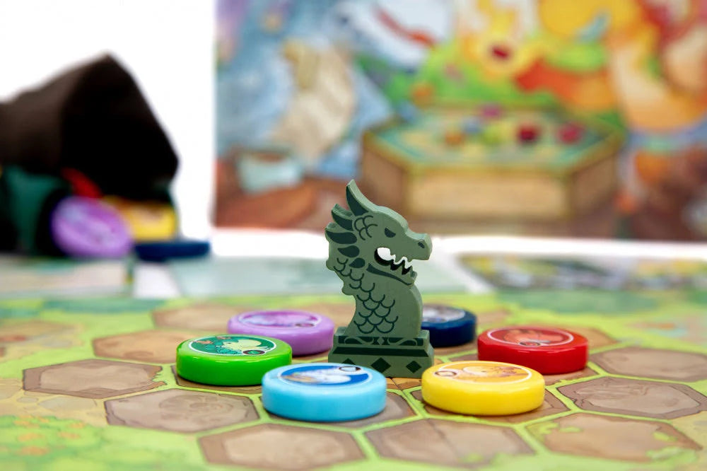 Flamecraft Duels, close-up of board game piece with a dragon and tokens on a colourful game board