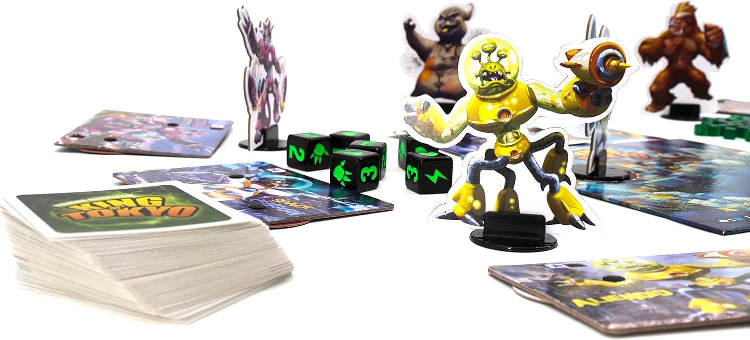 Toy figures and cards on a white surface