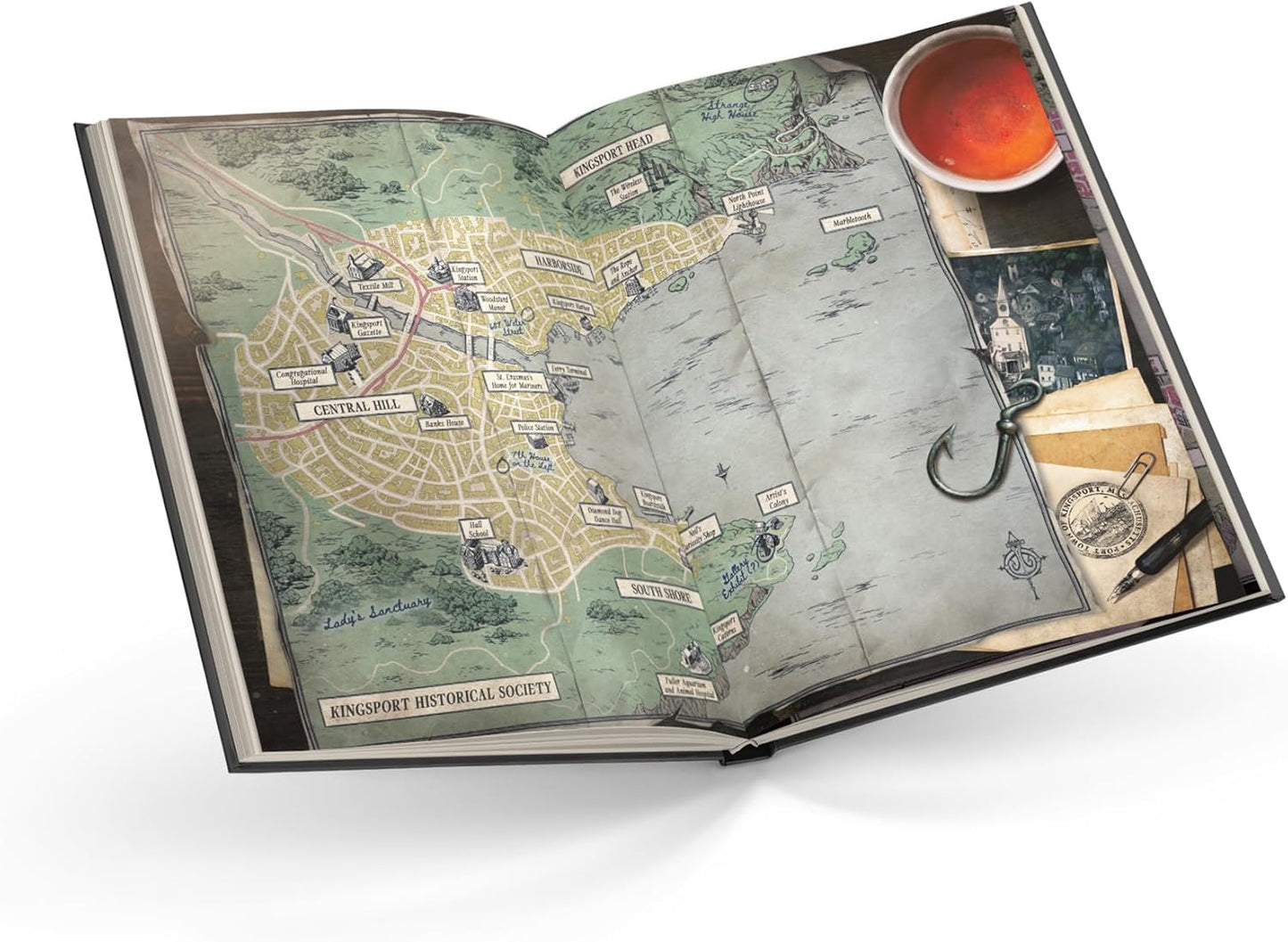 Open book with a detailed map and vintage-style illustrations on a white background