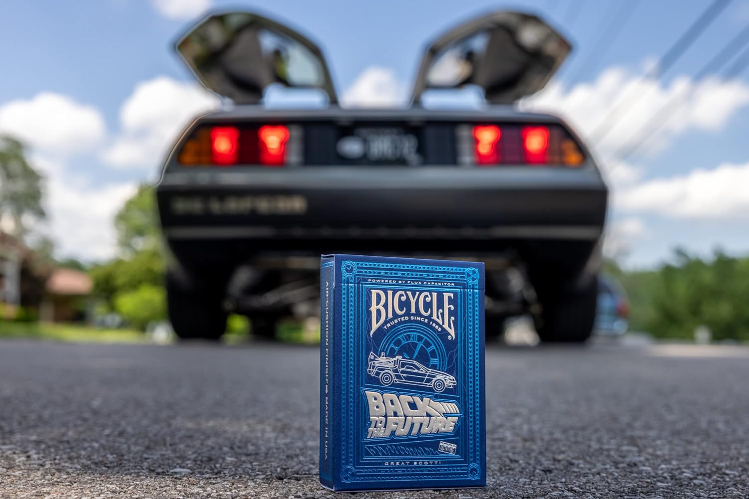 Bicycle Back to the Future playing cards with a DeLorean in the background