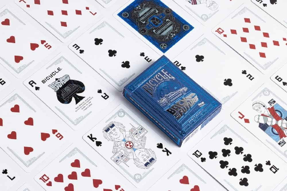 Blue Bicycle playing cards on a white background with other playing cards.