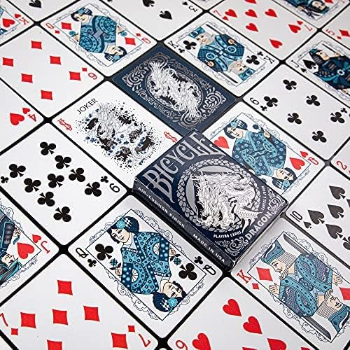 Playing cards with blue and white designs on a checkered background