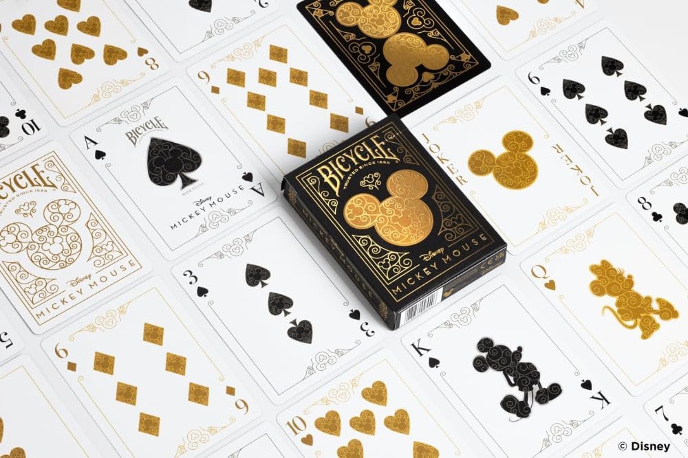 Bicycle Mickey Mouse playing cards on a white background with card designs.