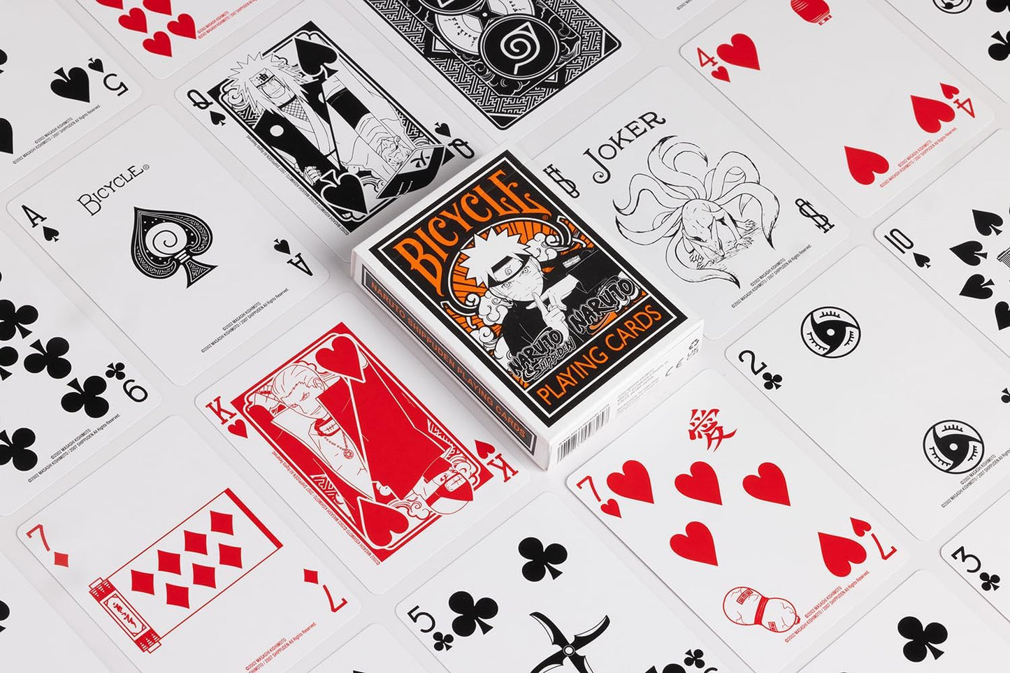 Bicycle playing cards with various card designs on a white background
