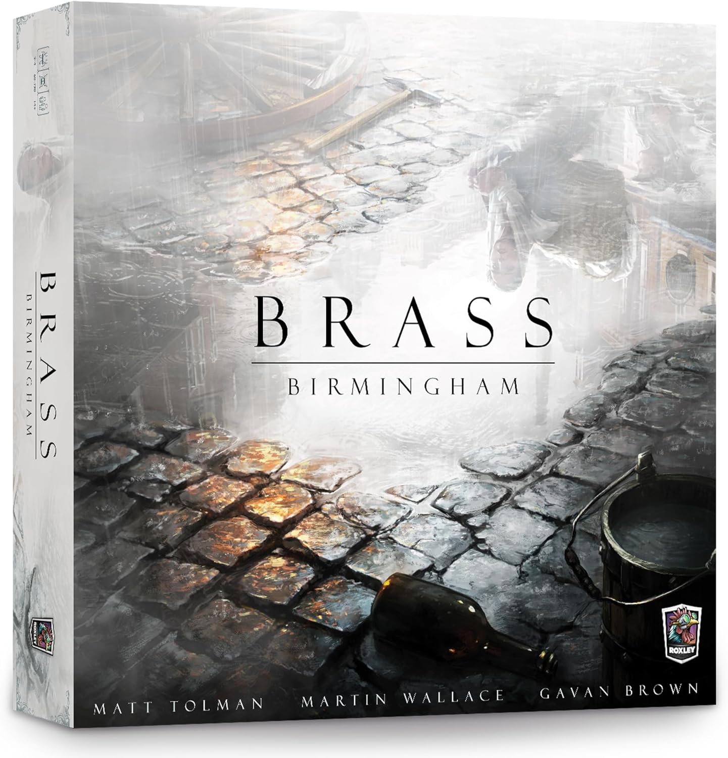 Board game box titled 'Brass Birmingham' with a stone pavement and tea cup design.