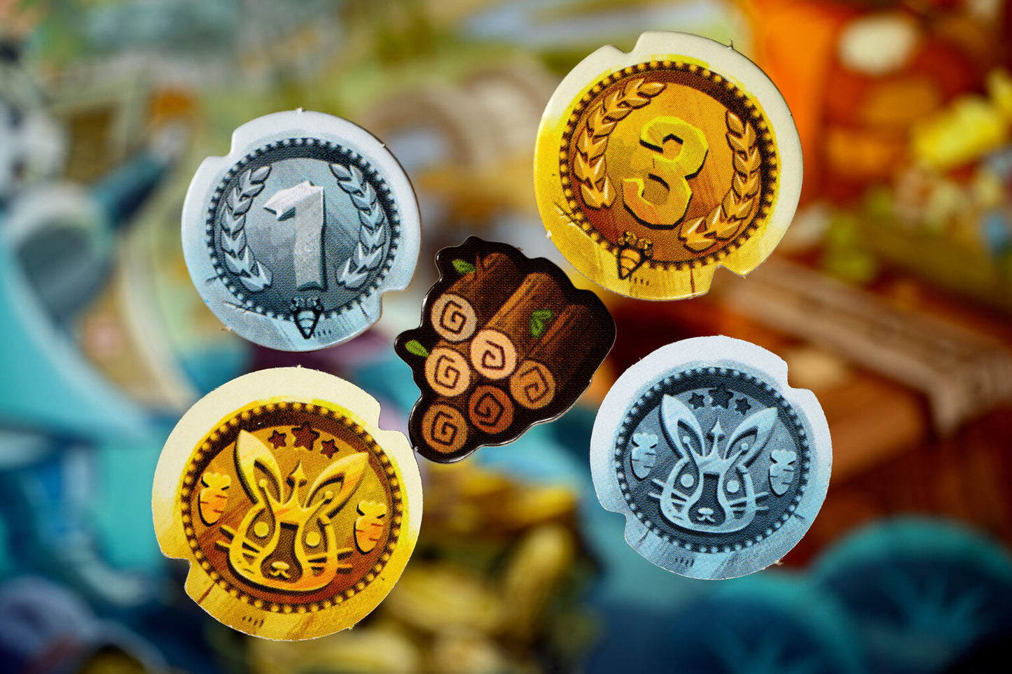 Decorative coins with symbols for Bunny Kingdom Town on a blurred background