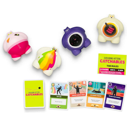 Colourful toy catchables with cards on a white background