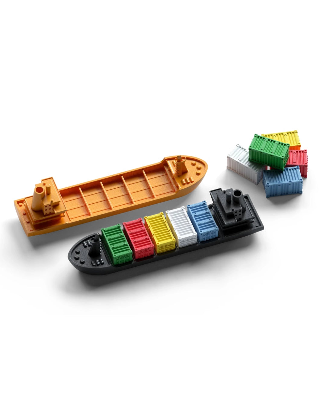 Two toy cargo ships and small colourful shipping containers for the board game Container by Allplay, on a clean white background. One ship is orange-brown, and the other is black, both with stacked multicoloured containers along the side.