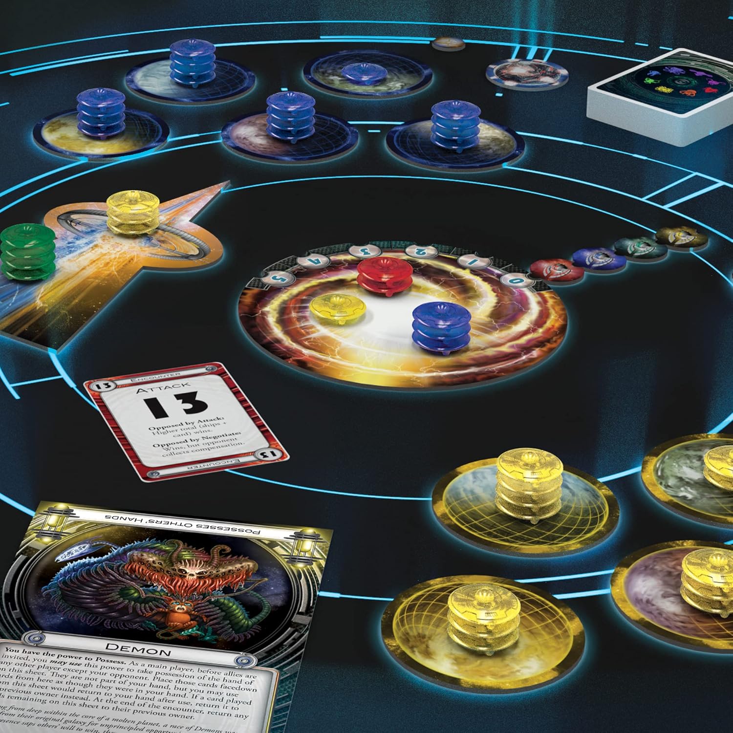 Cosmic Encounter board game setup with various game pieces and cards on a dark surface