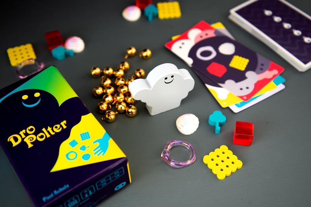 Dro Polter Dexterity game and components on a dark surface