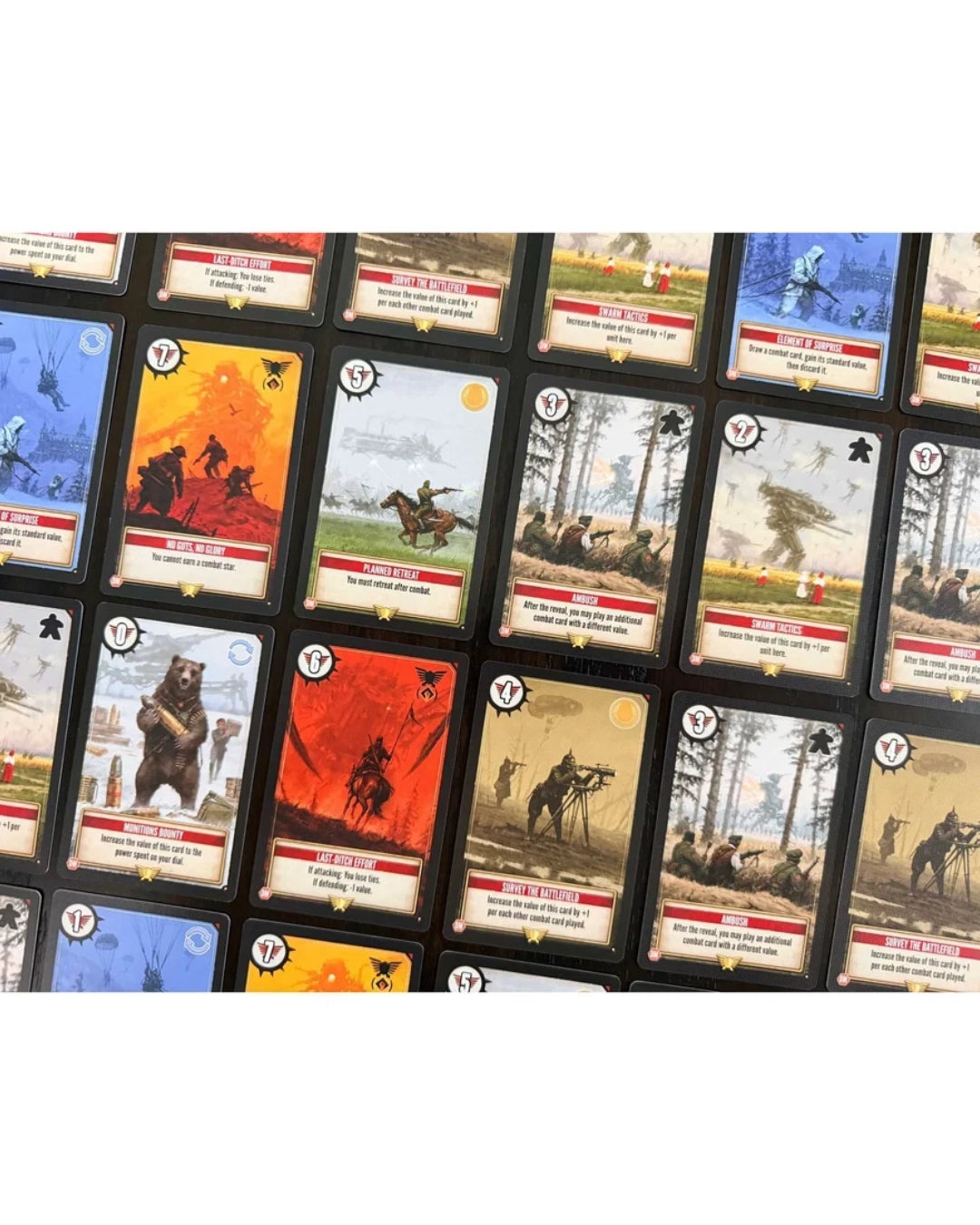 A close-up grid of illustrated game cards for Duel of Meloch: Scythe vs Expeditions in black sleeves, showing fantasy and historical-style scenes with red, orange, blue, and beige artwork.