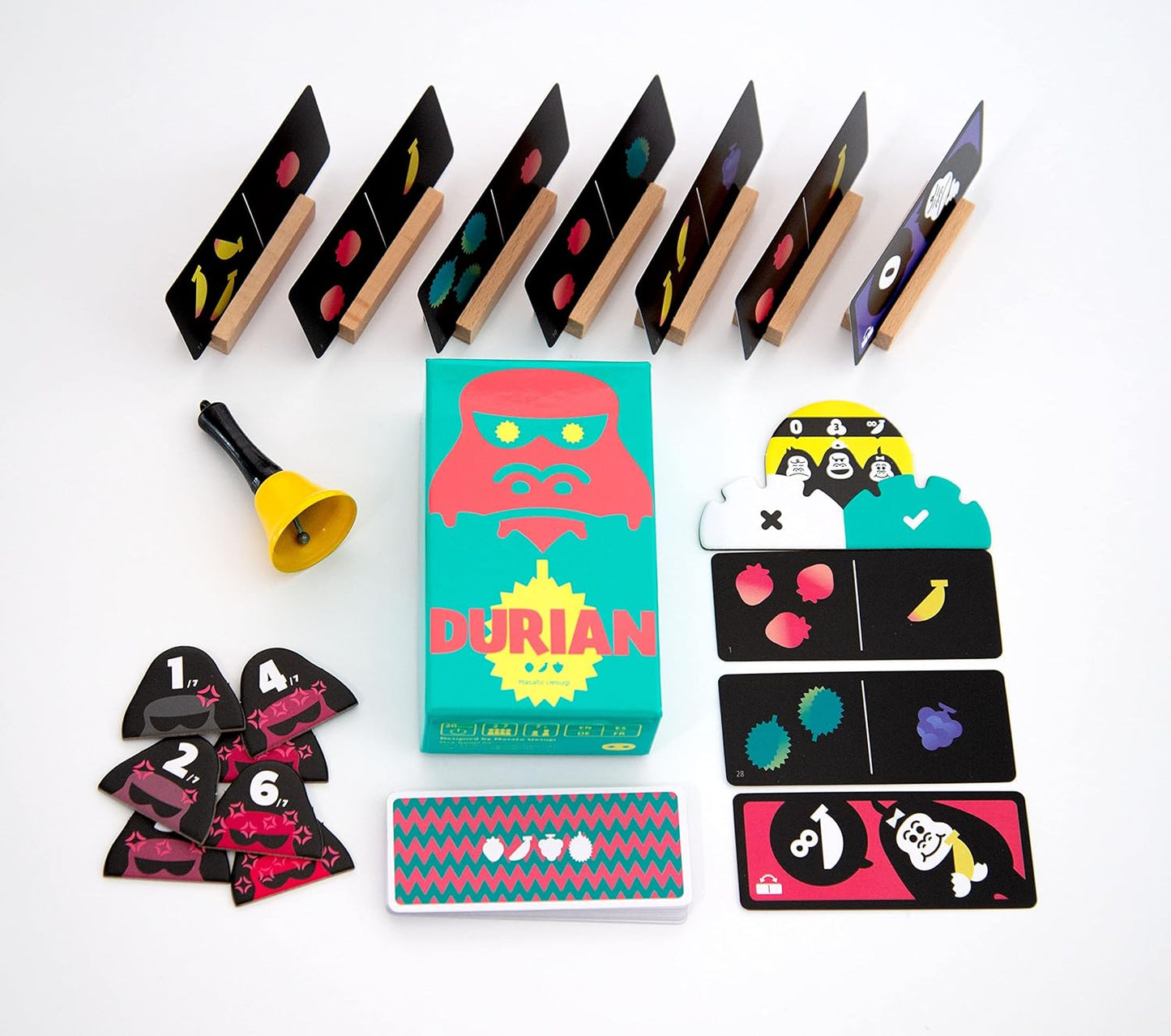Durian board game components, including cards and a bell on a white background