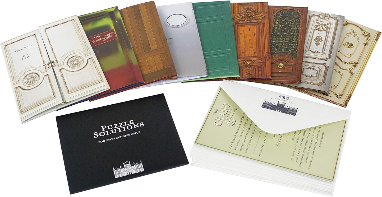 Collection of puzzle boxes with 'Puzzle Solutions' book on a white background