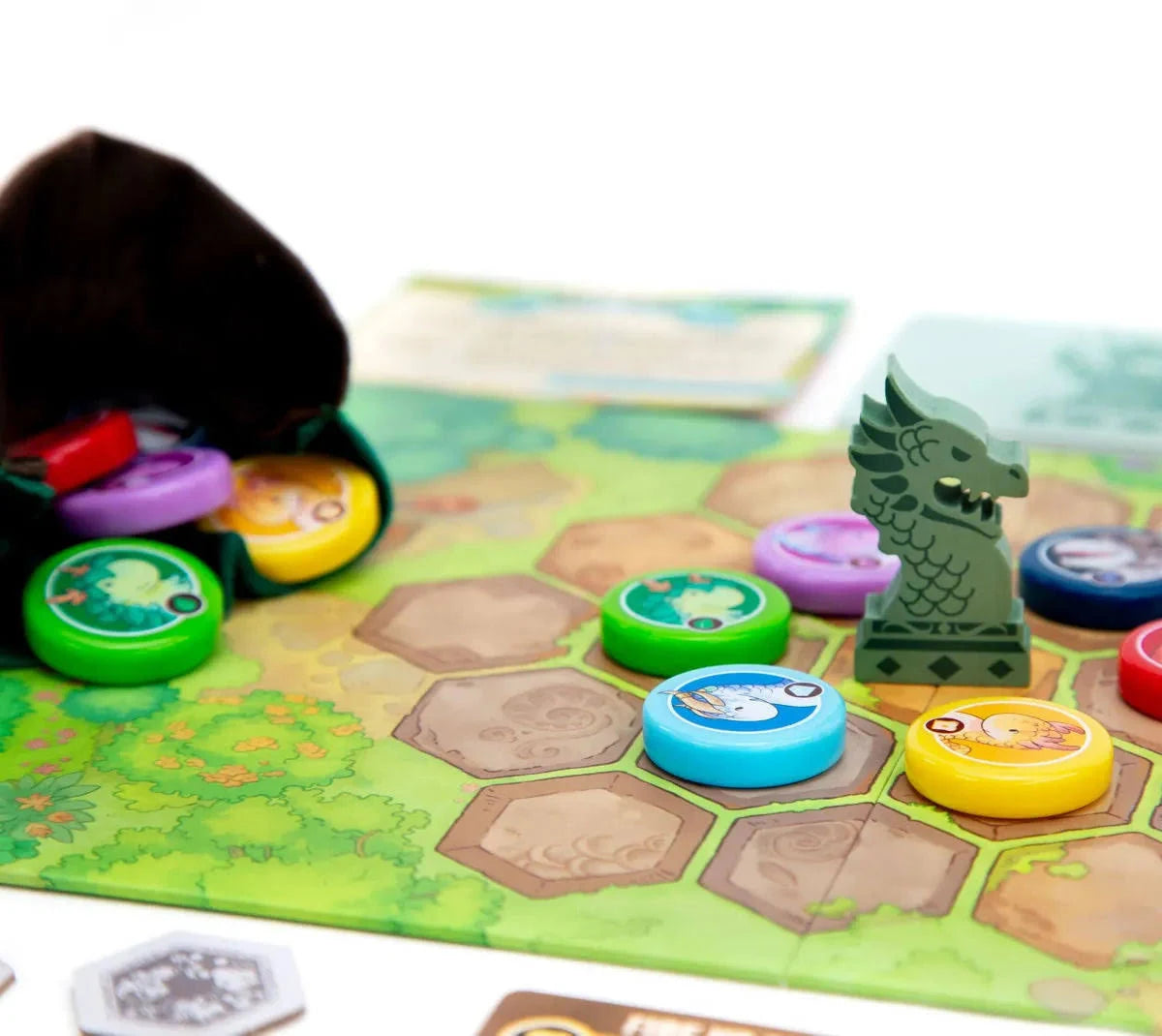 Board game with colourful game pieces for Flamecraft Duels on a white background
