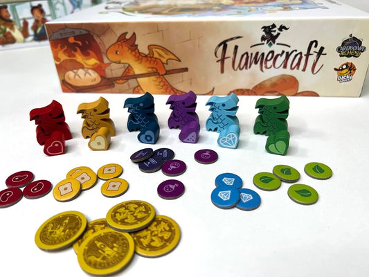 Board game components including figurines and tokens with 'Flamecraft' box in the background