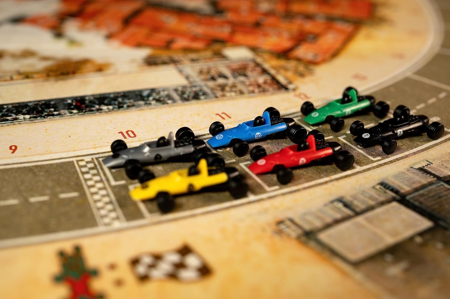 Board game with race cars on a track