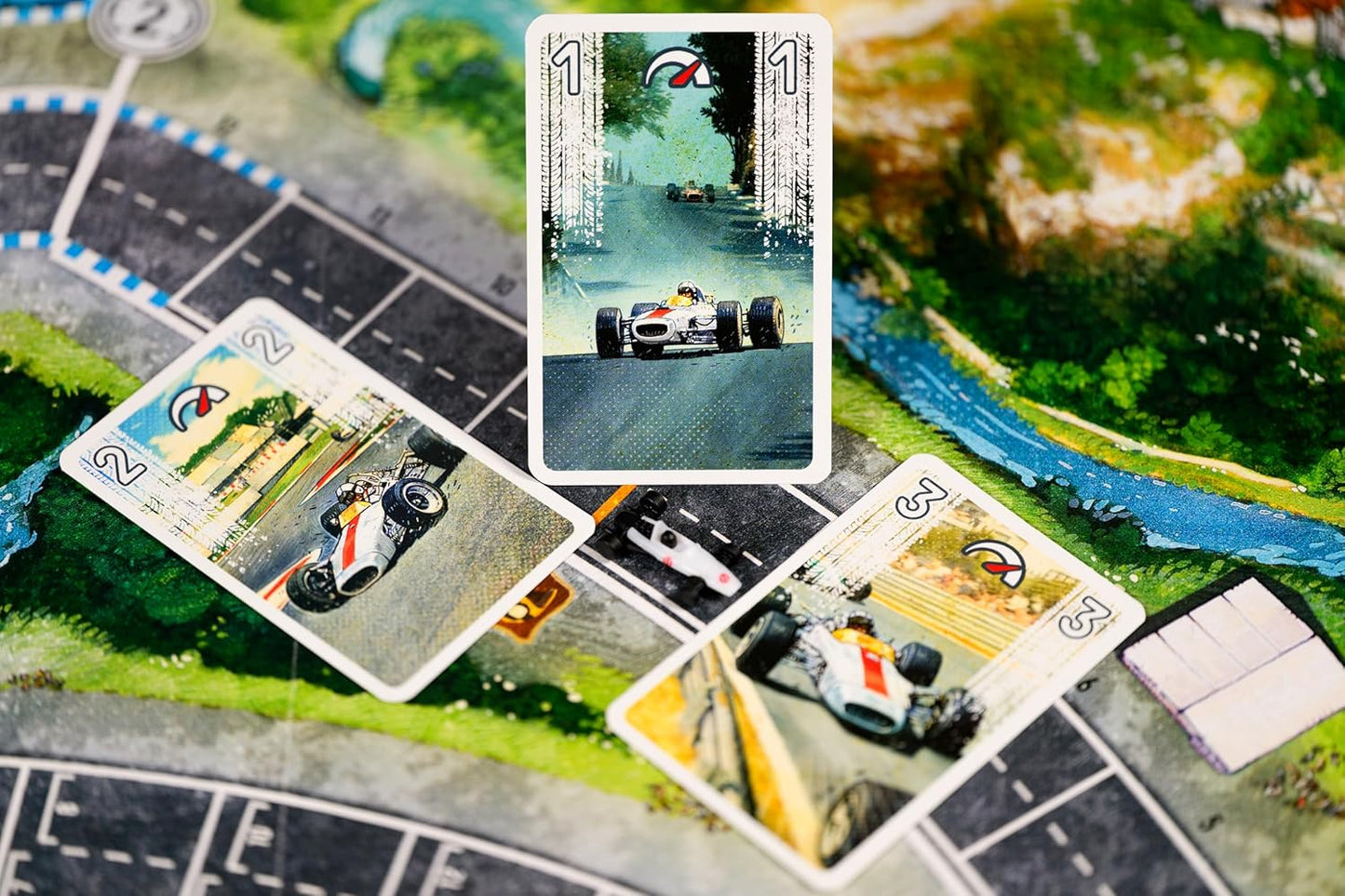 Board game with racing-themed cards on a track layout