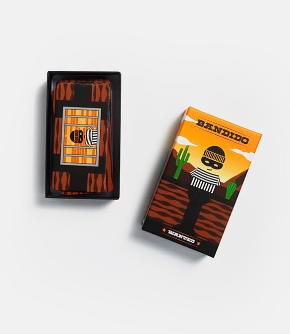 Two packaging boxes with artistic designs on a light gray background