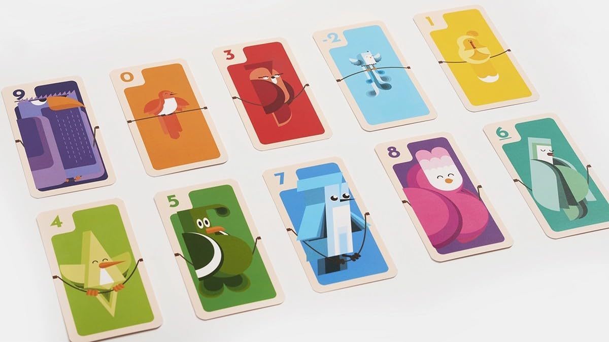 Set of colourful playing cards with cartoon characters on a white background