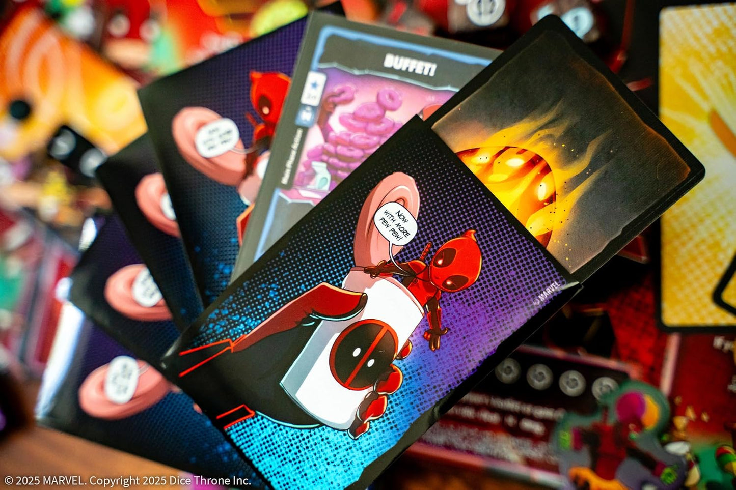 Collection of trading cards featuring a character in a superhero costume on a colorful background.