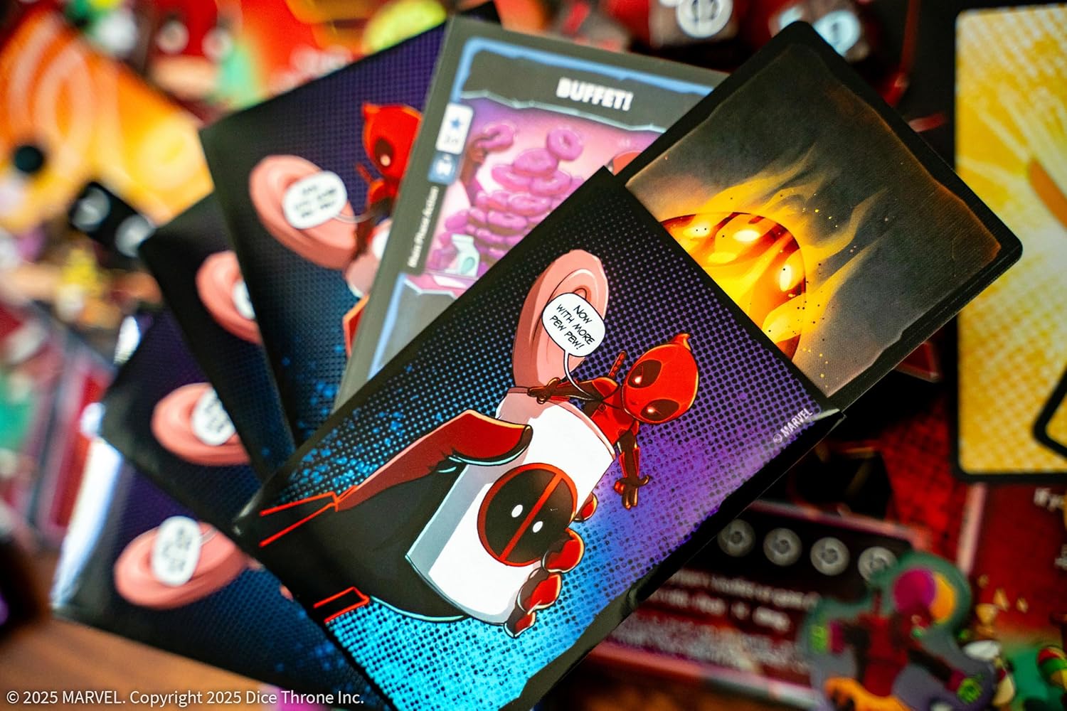 Collection of trading cards featuring a character in a superhero costume on a colorful background.