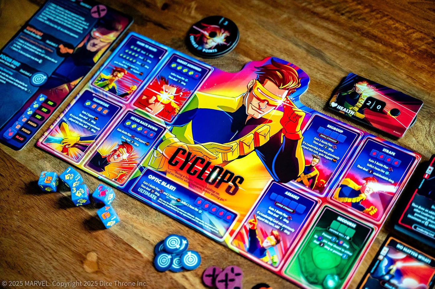 Marvel superhero trading cards on a wooden surface with 'Cyclops' card prominently displayed.
