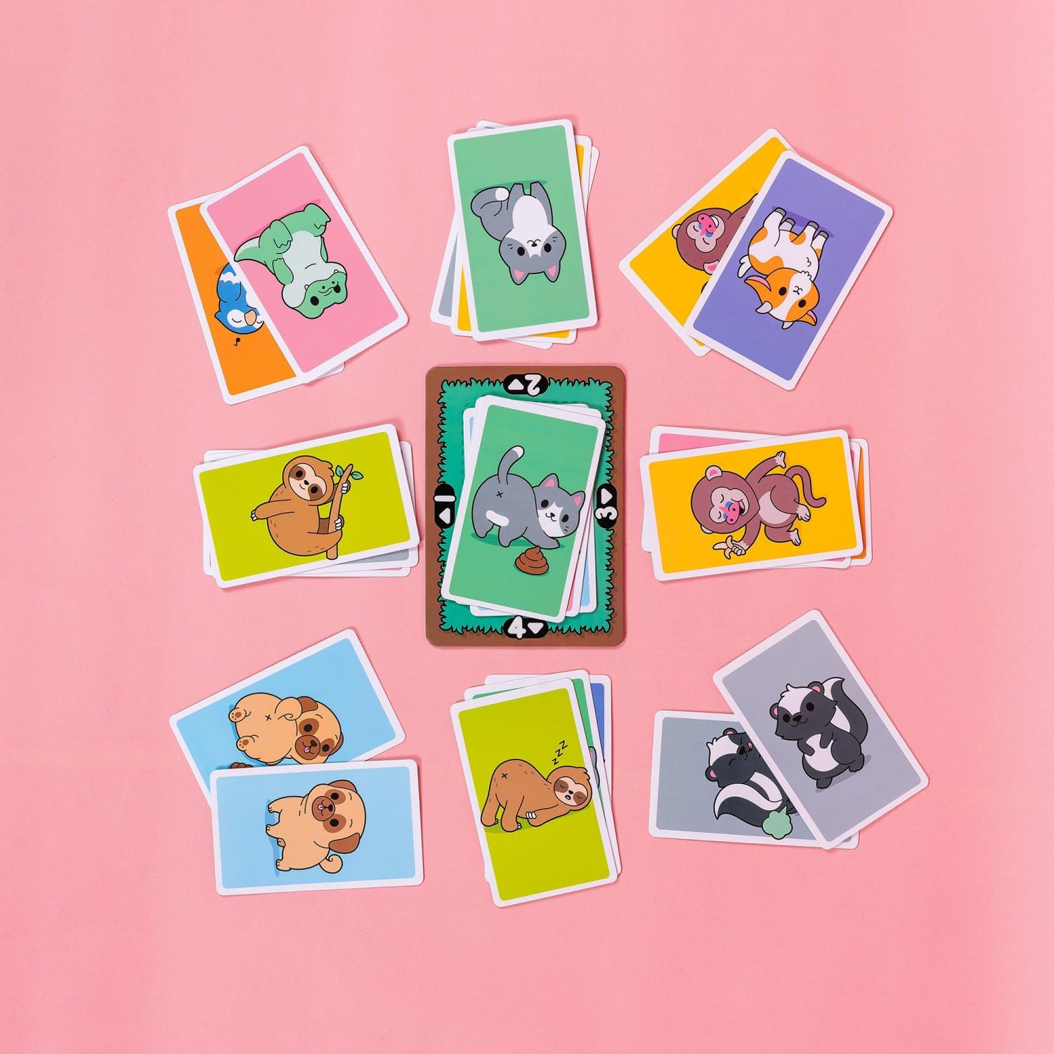 Colorful animal-themed cards on a pink background