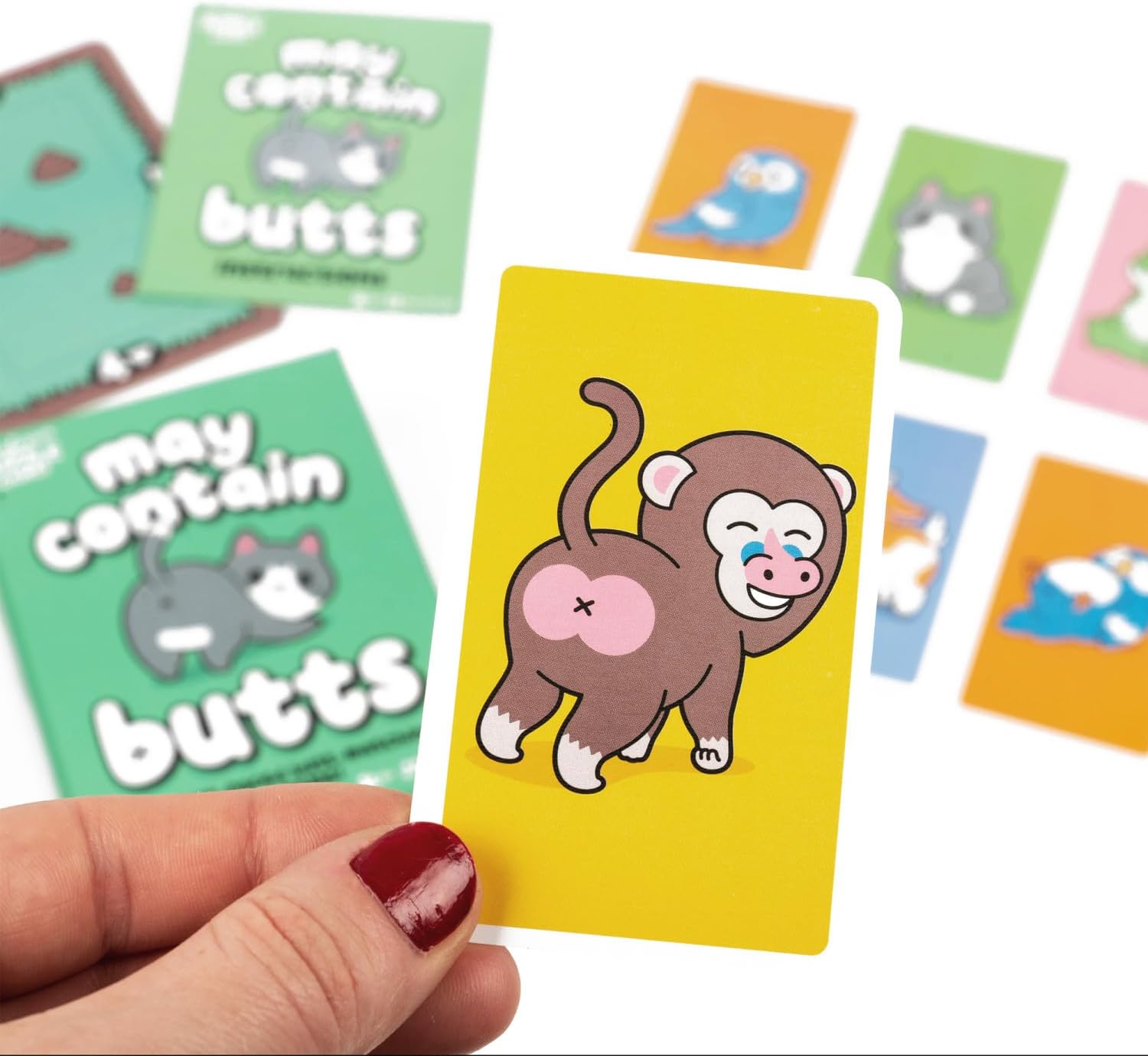 Colourful children's card game cards with cartoon illustrations and text.