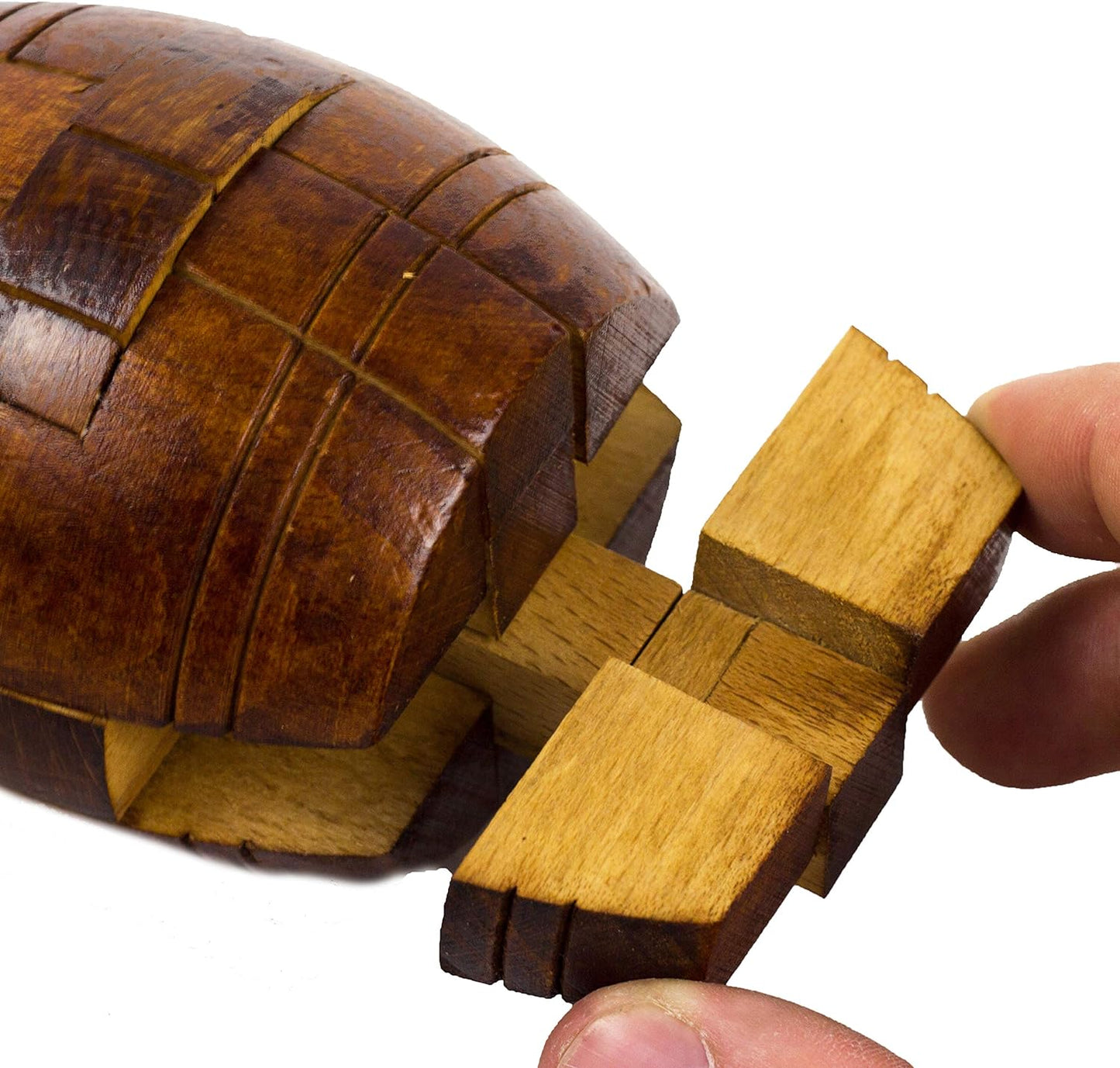 Nelson's Barrel puzzle by professor puzzle removing a wooden piece