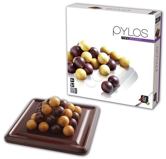 Pylos mini board game packaging with chocolate-like balls on a white background