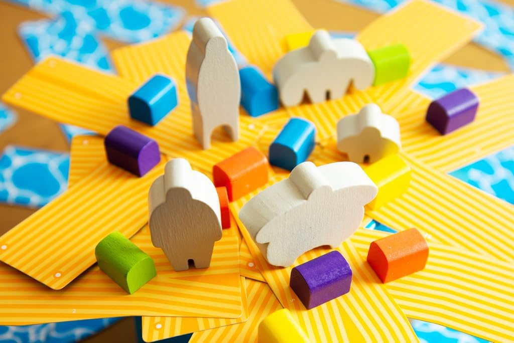 Colourful wooden meeples on a yellow cards with multicoloured treasure chests.