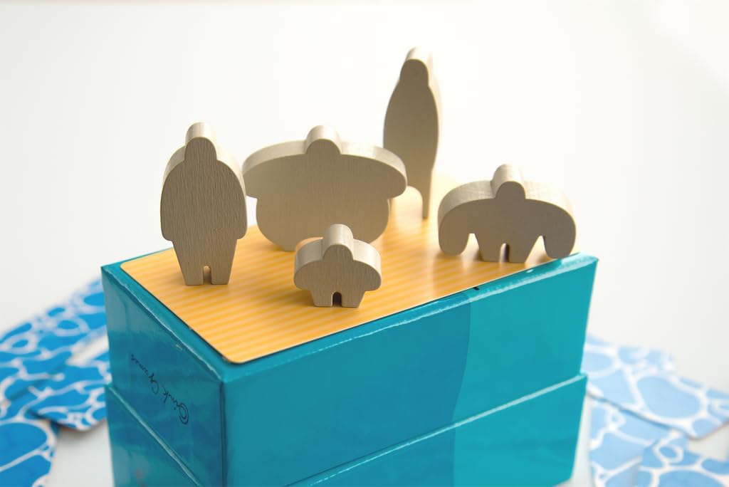 Wooden meeple figures on a blue stand with a white background