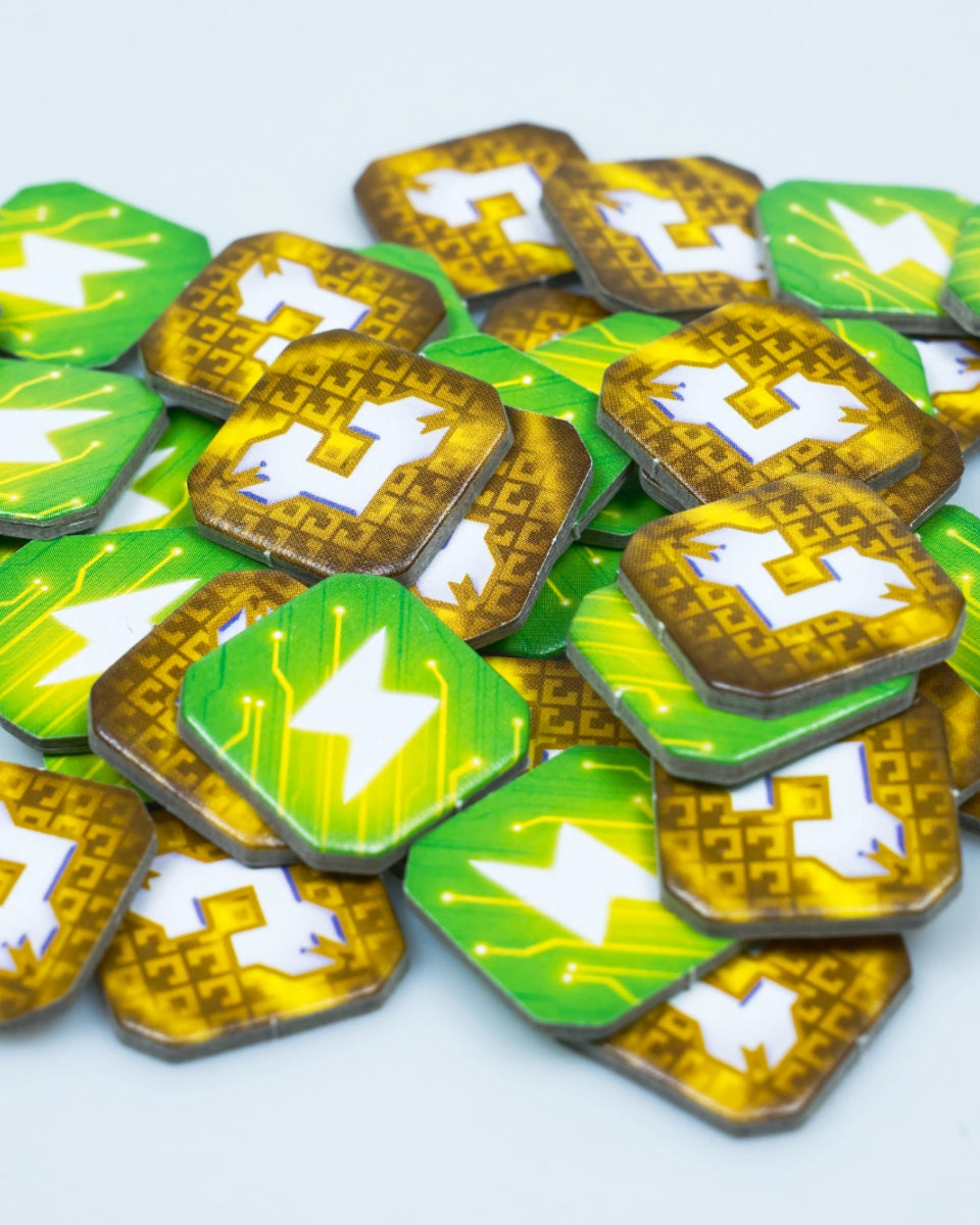 A pile of small hexagonal game tokens or chips for SETI: search for extraterrestrial intelligence board game, on a light grey background. Each token is green with a white lightning bolt symbol and a gold circuit-like border pattern.