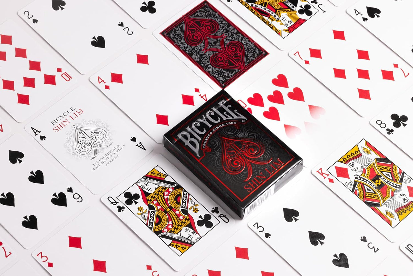Bicycle playing cards with various card faces displayed on a white background