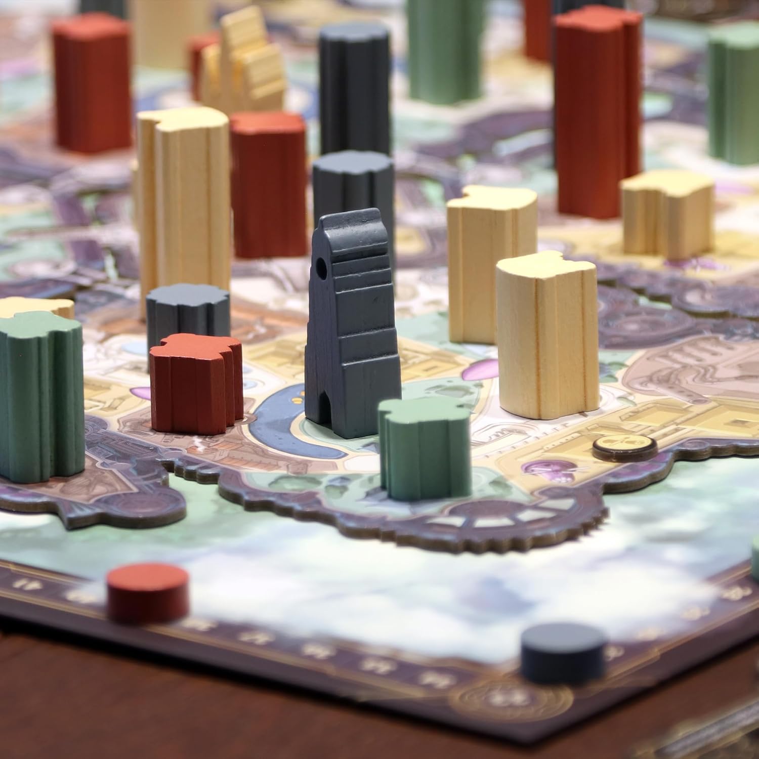 Skyrise board game with colourful pieces on a map
