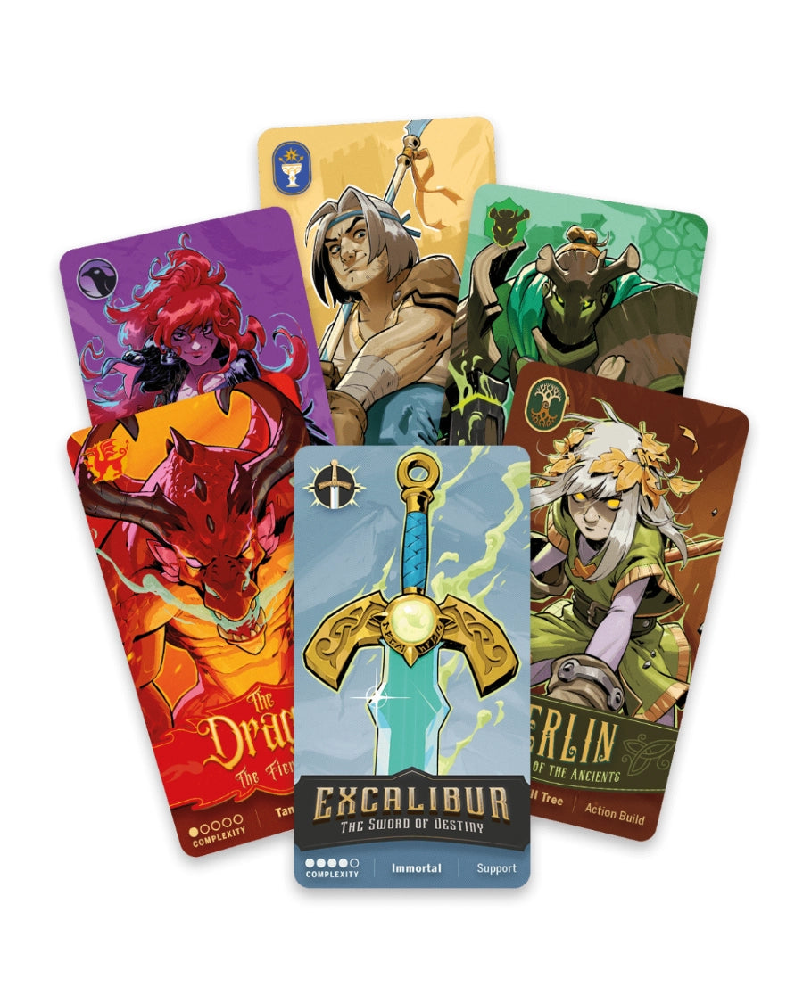 Scorpion Masque 'Tag Team: Arthur's Legacy' card game. Five illustrated cards from Excalibur: The Sword of Destiny fanned out on a plain white background, showing fantasy artwork and card titles including Dragon, Fire, Berlin, and Arisfeld.