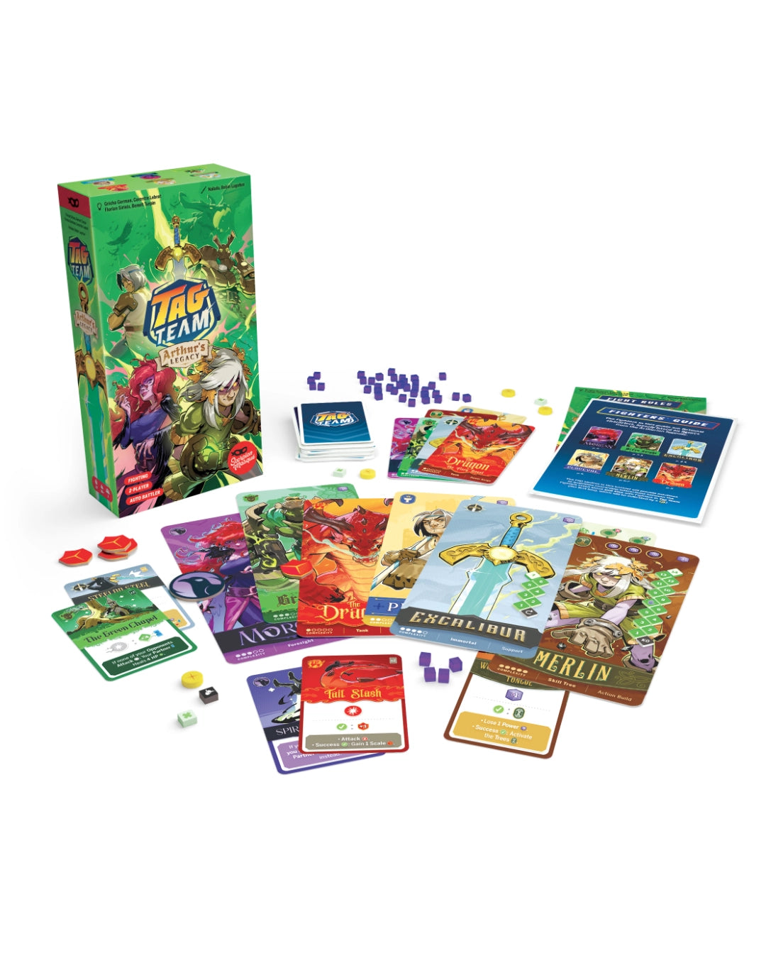 Scorpion Masque 'Tag Team: Arthur's Legacy' card game set with its green illustrated box, scattered character cards, play cards, tokens, and dice on a clean white background.