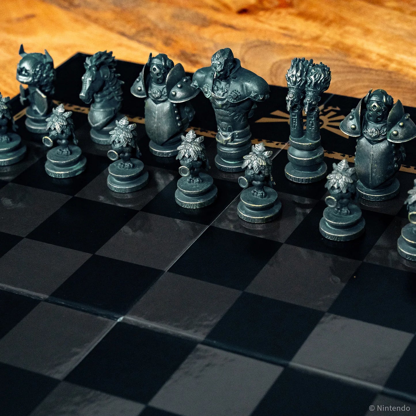 The Legend of Zelda Chess pieces on a chessboard with a wooden surface