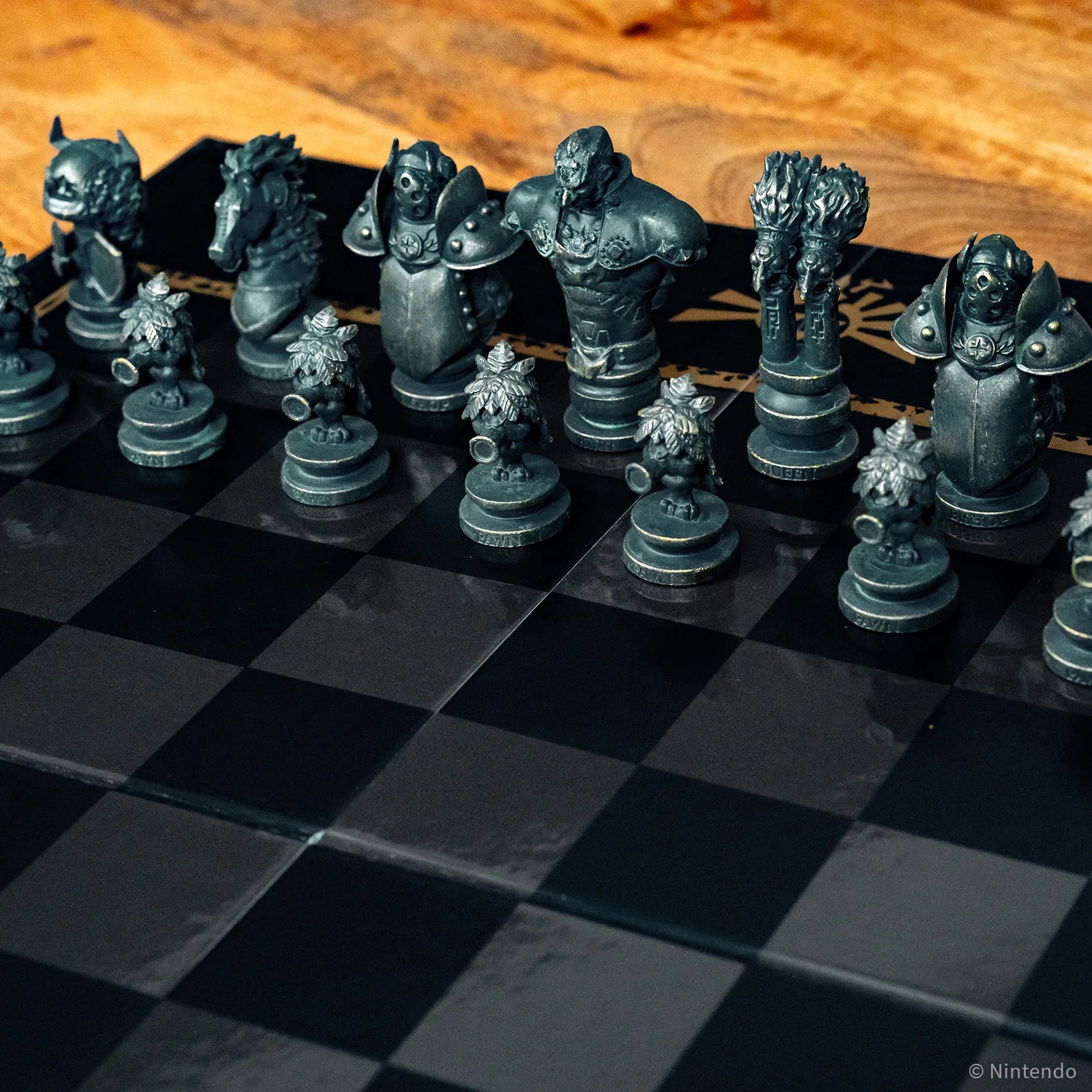 The Legend of Zelda Chess pieces on a chessboard with a wooden surface