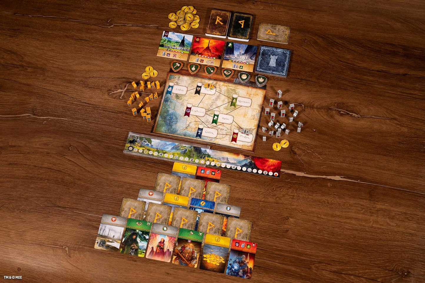 Board game components on a wooden surface