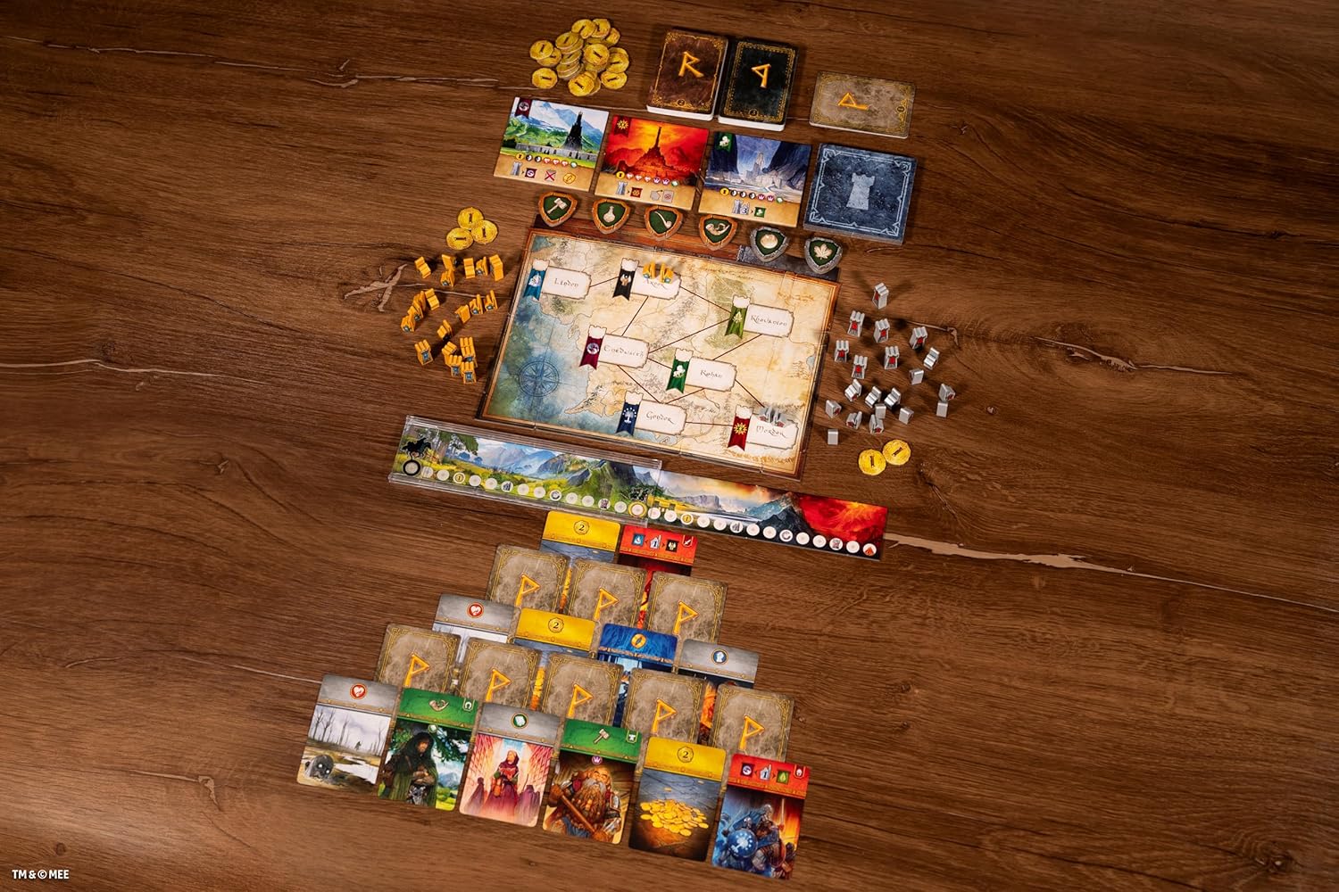 Board game components on a wooden surface