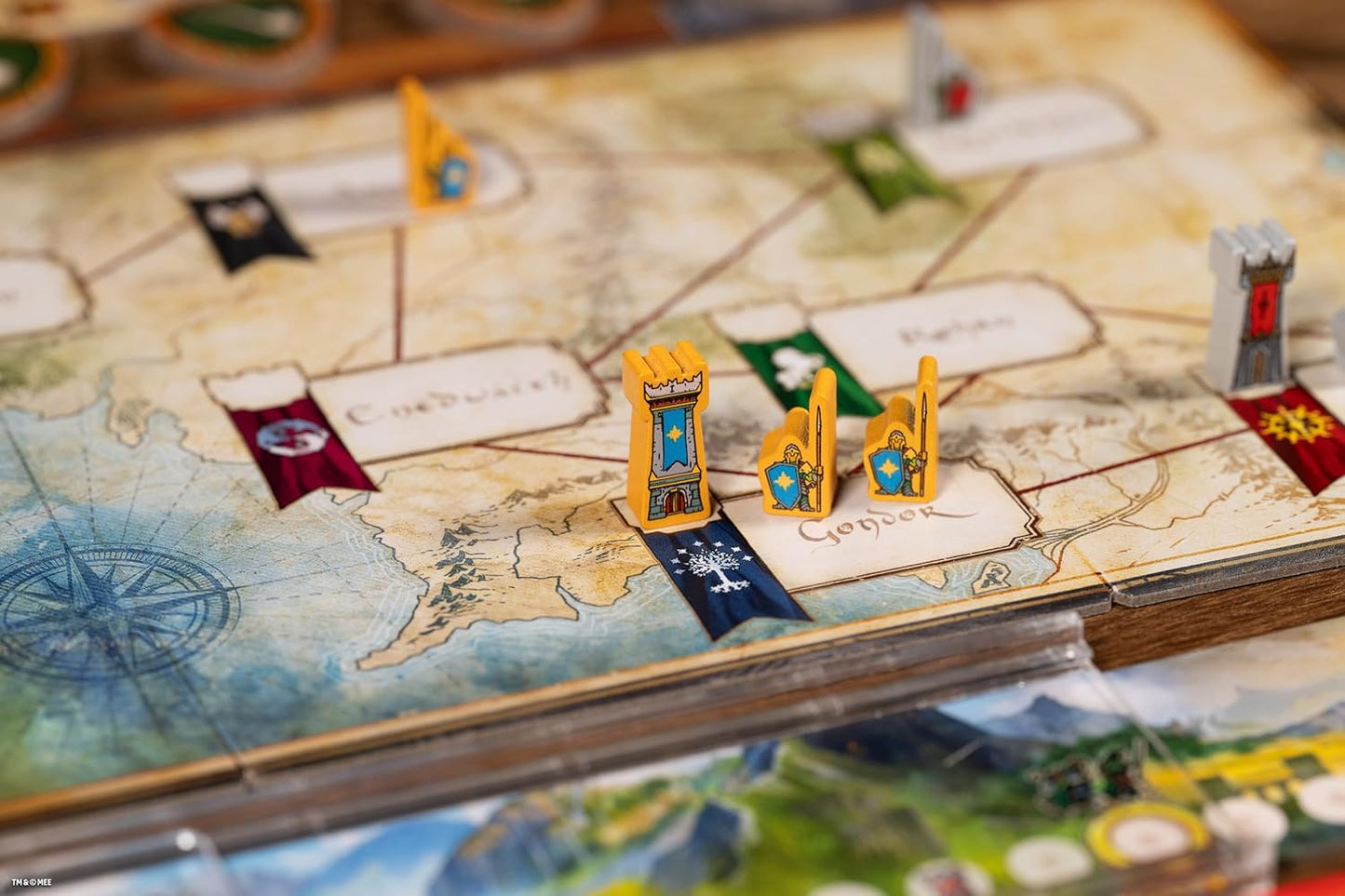 Board game with game pieces on a map