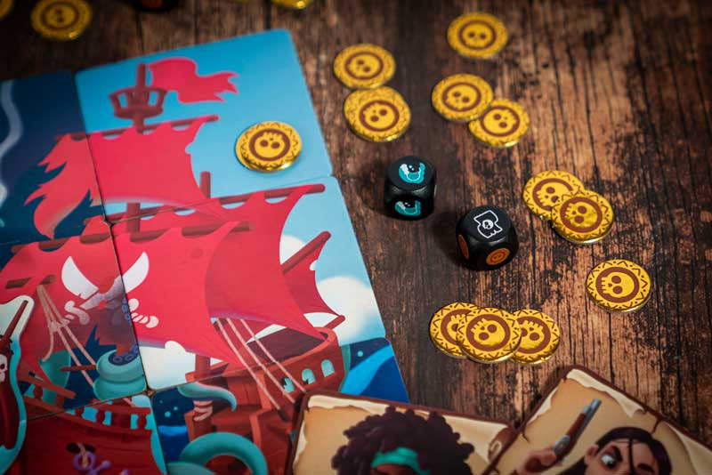Traitor tide dice game close up of tokens and dice