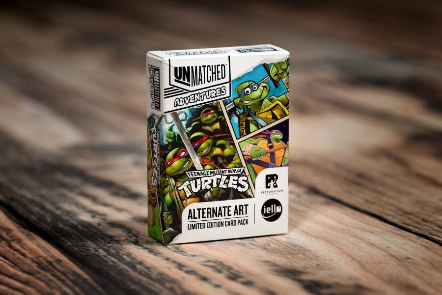 Unmatched Adventures: Teenage Mutant Ninja Turtles Alternate Art pack product packaging on a wooden table