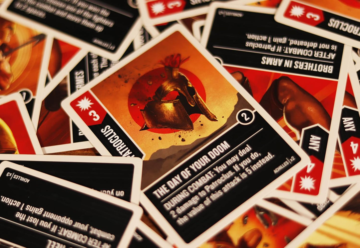 Collection of game cards with various designs and text