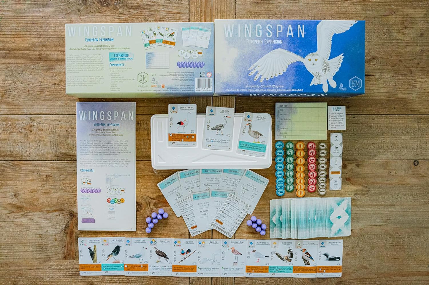 Wingspan European Expansion box contents laid out on wooden table
